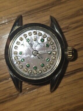 Rolex Silver Watch Case with Gold Crown